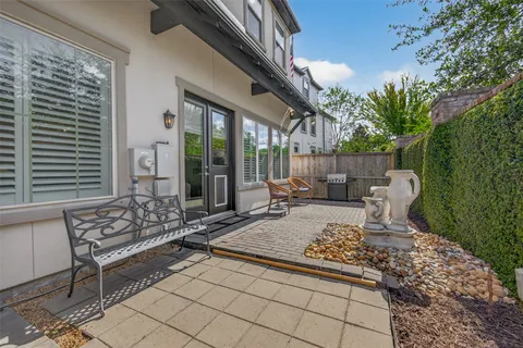 a outdoor space with the couches and dining table chair