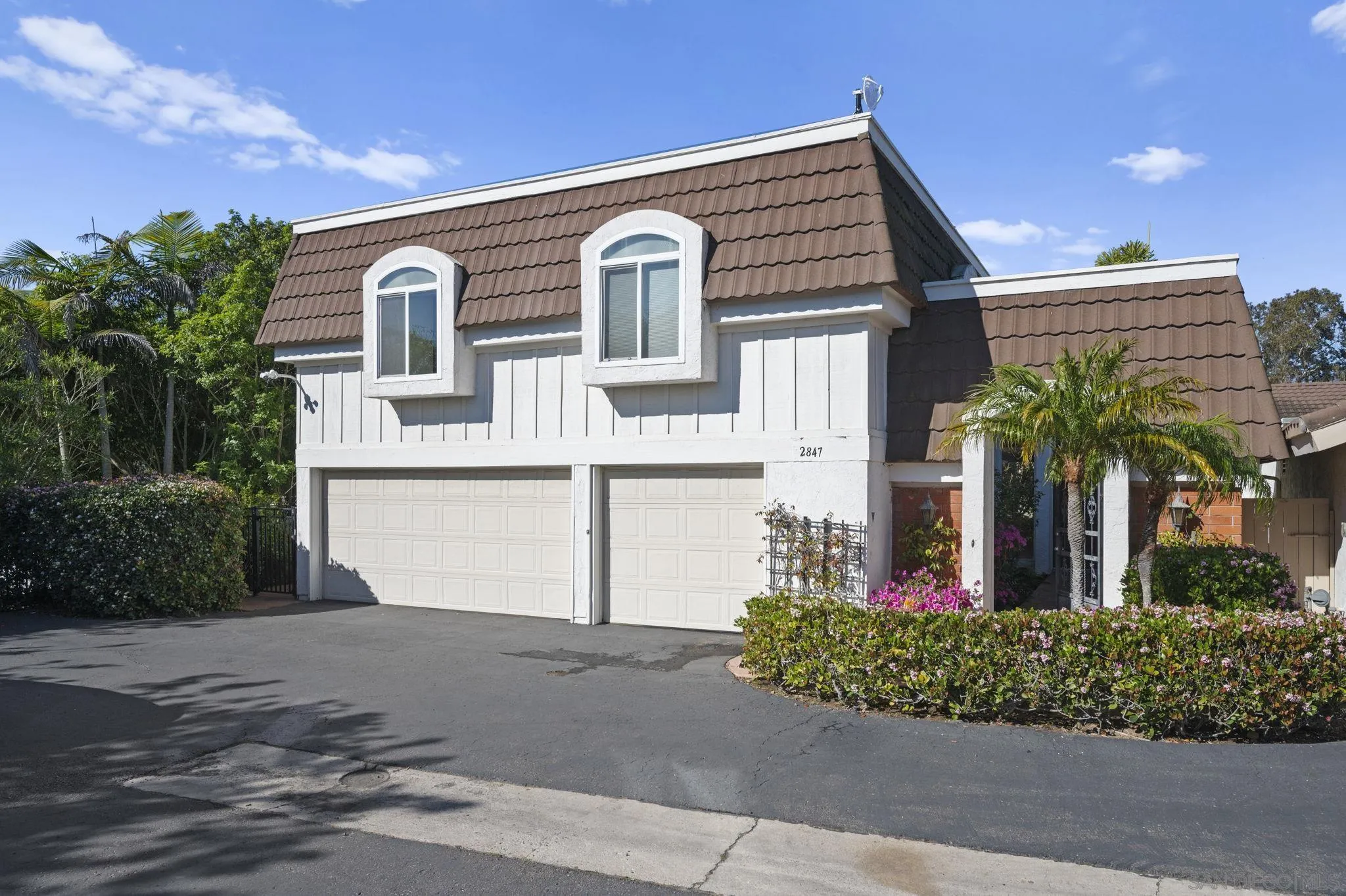 2847 Via Posada La Jolla, CA 92037 - Photo 2 of 21 a front view of a house with a yard