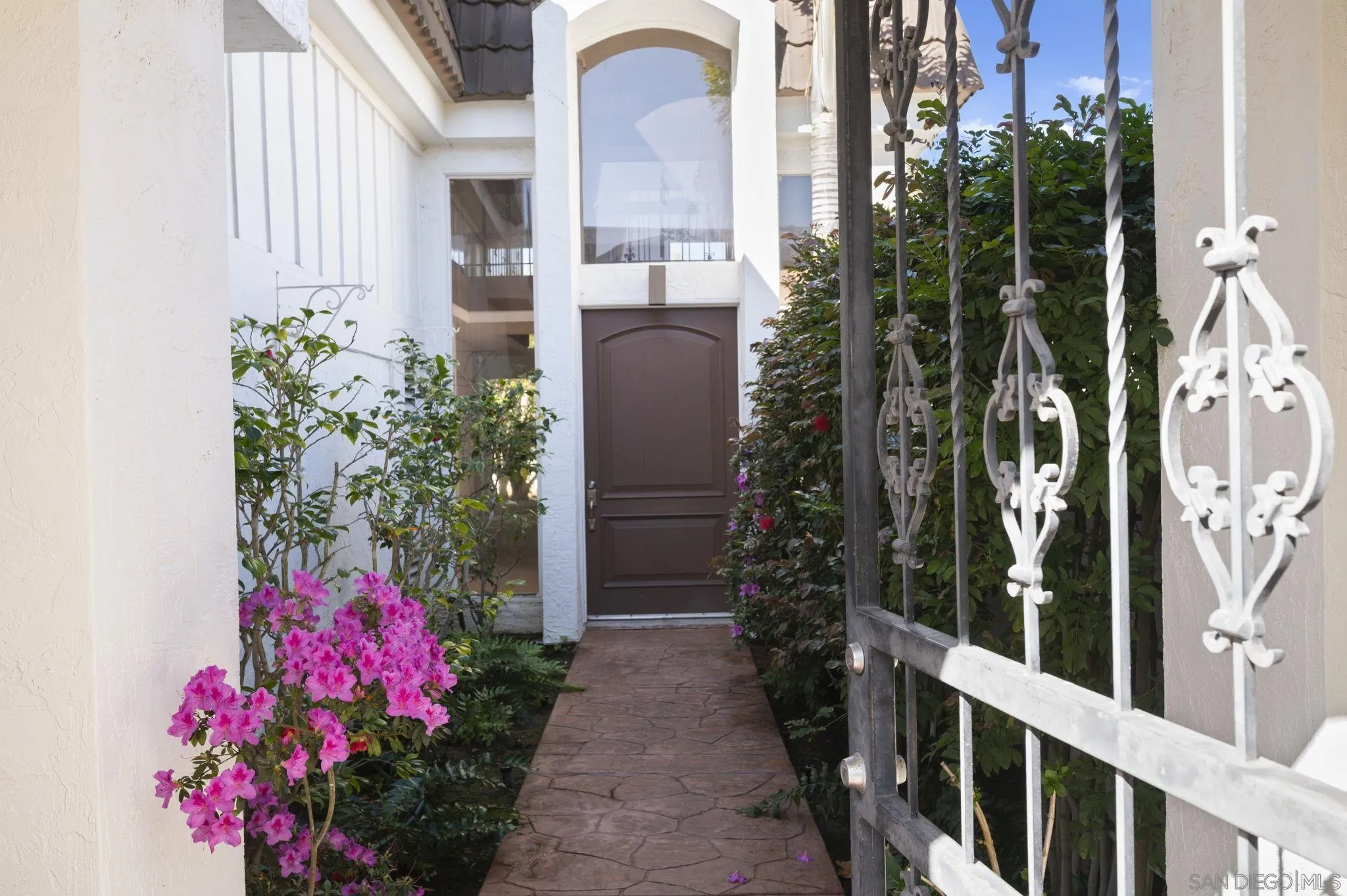 2847 Via Posada La Jolla, CA 92037 - Photo 4 of 21 a view of a house with a flower garden