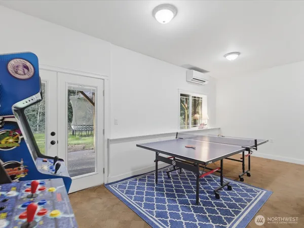 a work room with furniture and wooden floor