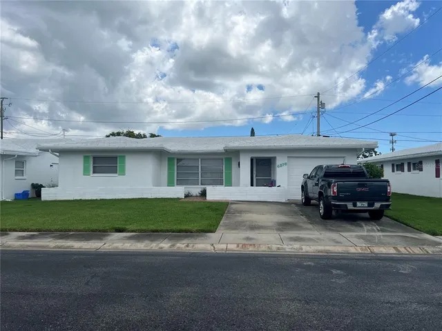 a car parked in front of a house