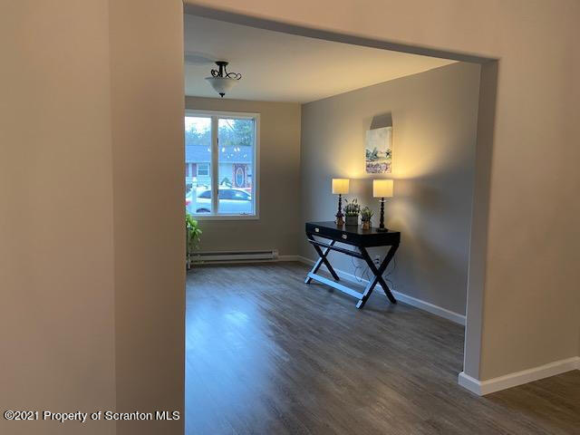 304 Main Street Scranton, PA 18507 - Photo 9 of 22 a living room with furniture and a window