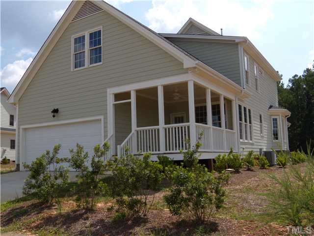 1210 Ileagnes Road Raleigh, NC 27603 - Photo 2 of 7 a view of a house with a yard