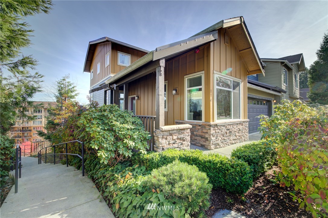 114 Cougar Ridge Road Northwest, Unit 1701 Issaquah, WA 98027 - Photo 1 of 25 front view of a house with a yard