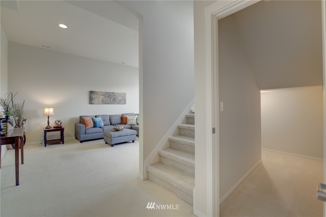 114 Cougar Ridge Road Northwest, Unit 1701 Issaquah, WA 98027 - Photo 20 of 25 a view of livingroom with furniture and white walls