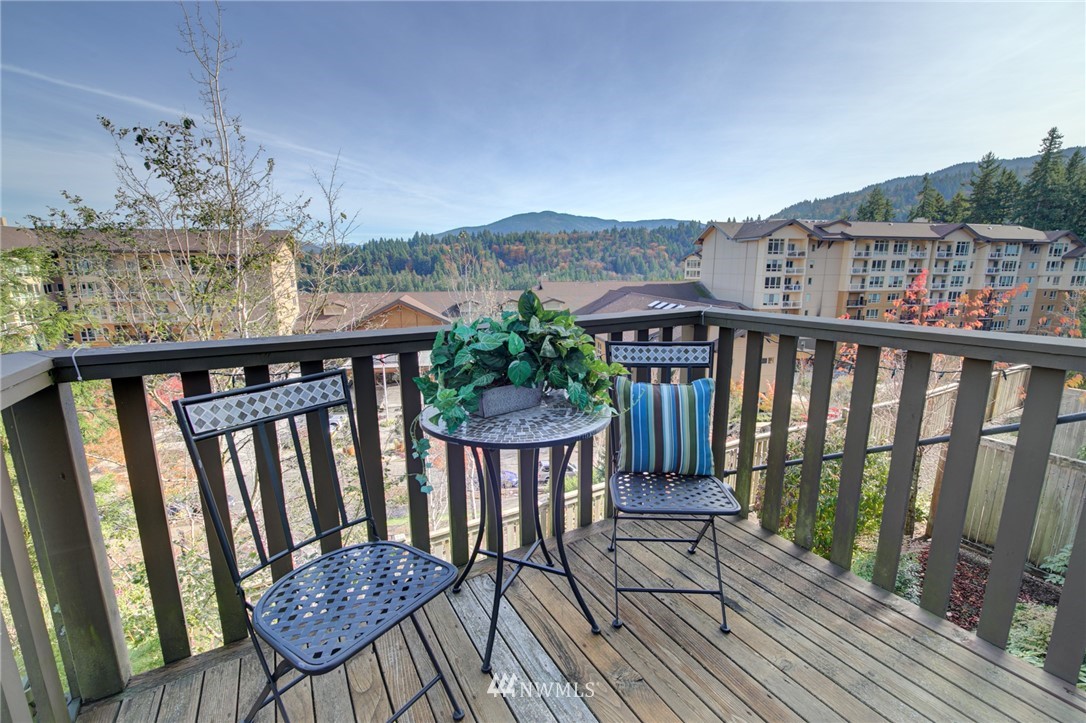 114 Cougar Ridge Road Northwest, Unit 1701 Issaquah, WA 98027 - Photo 25 of 25 a view of a balcony with furniture