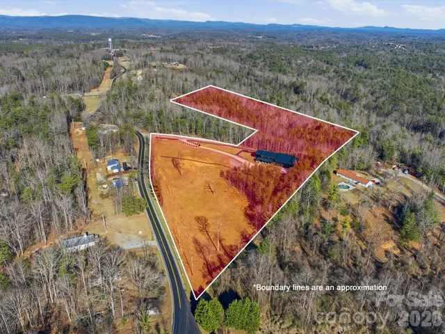 a view of a balcony with an outdoor seating
