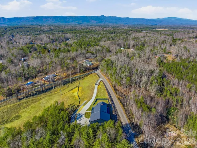 a view of a houses with a yard