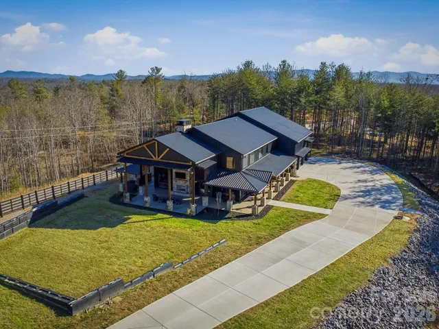 a view of a house with big yard