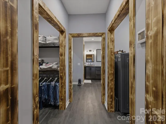 a view of a walk in closet and bedroom