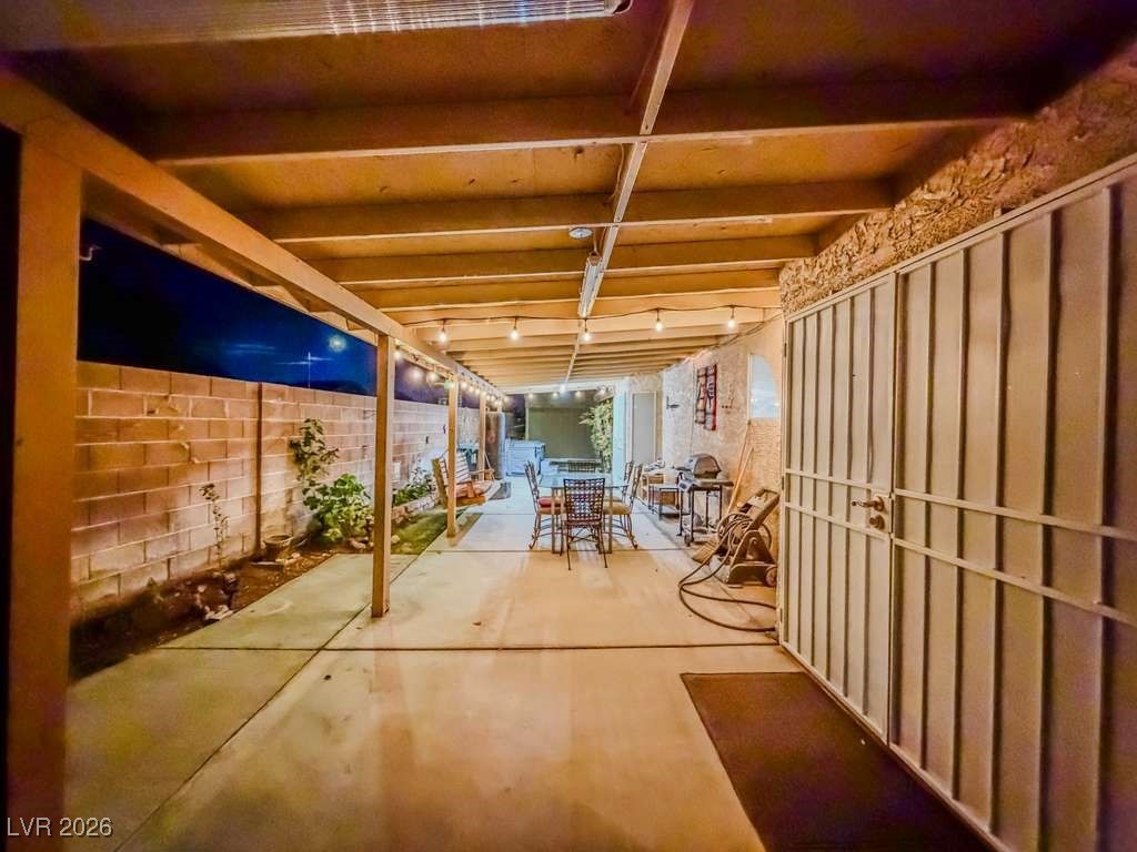 5308 Scoreboard Street Las Vegas, NV 89130 - Photo 9 of 32 Fenced backyard featuring outdoor dining space and a patio