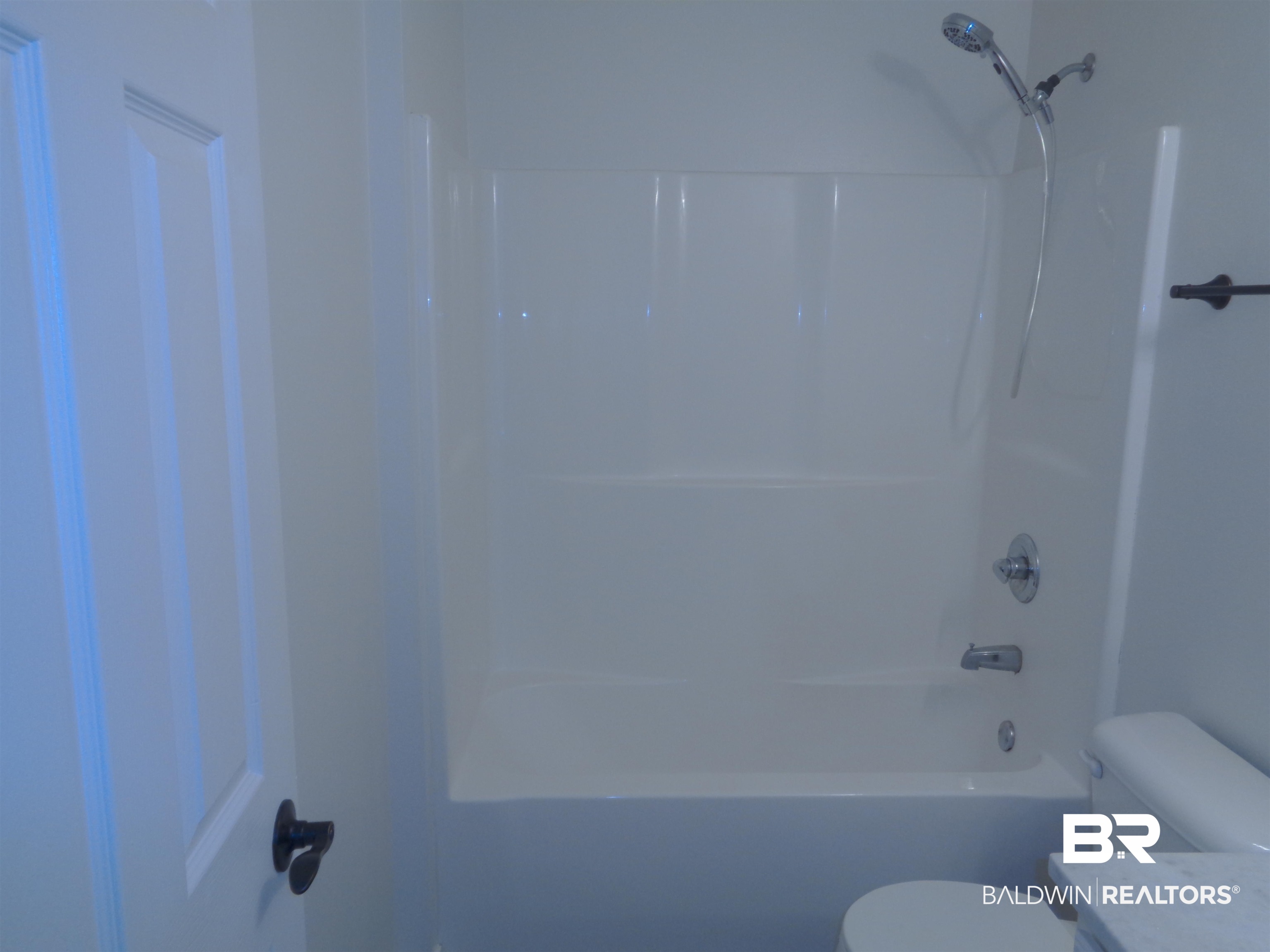 1557 Majesty Loop Foley, AL 36535 - Photo 20 of 25 Tub/shower enclosure.