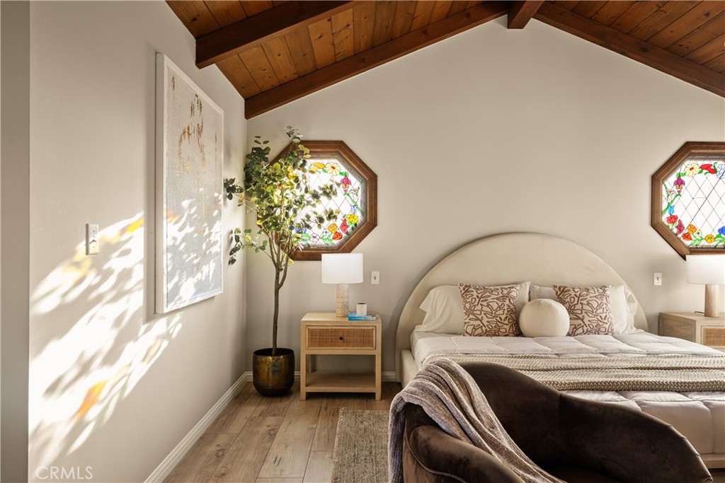 1819 Richard Street Burbank, CA 91504 - Photo 17 of 29 a bedroom with a bed and a chandelier