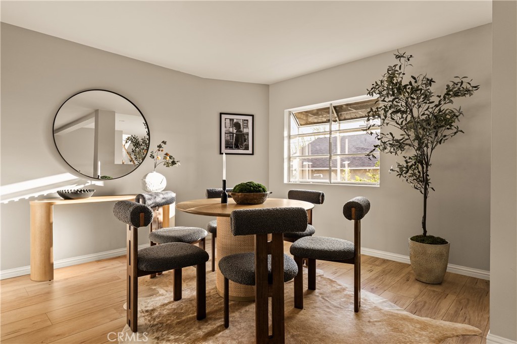 1819 Richard Street Burbank, CA 91504 - Photo 7 of 29 a living room with furniture a window and a potted plant
