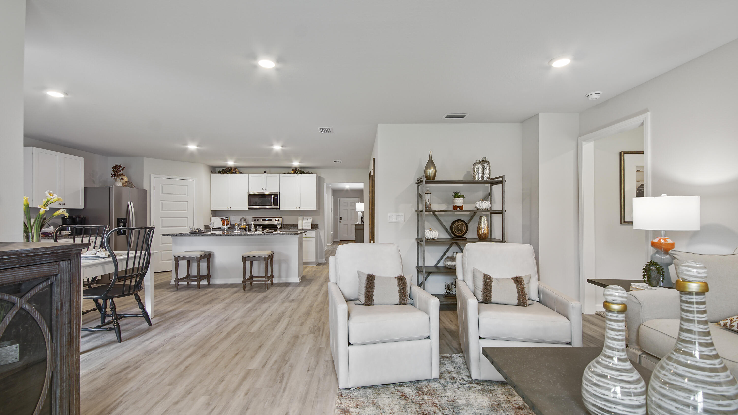 203 Eunola Lane Freeport, FL 32439 - Photo 10 of 38 a living room with furniture and a wooden floor