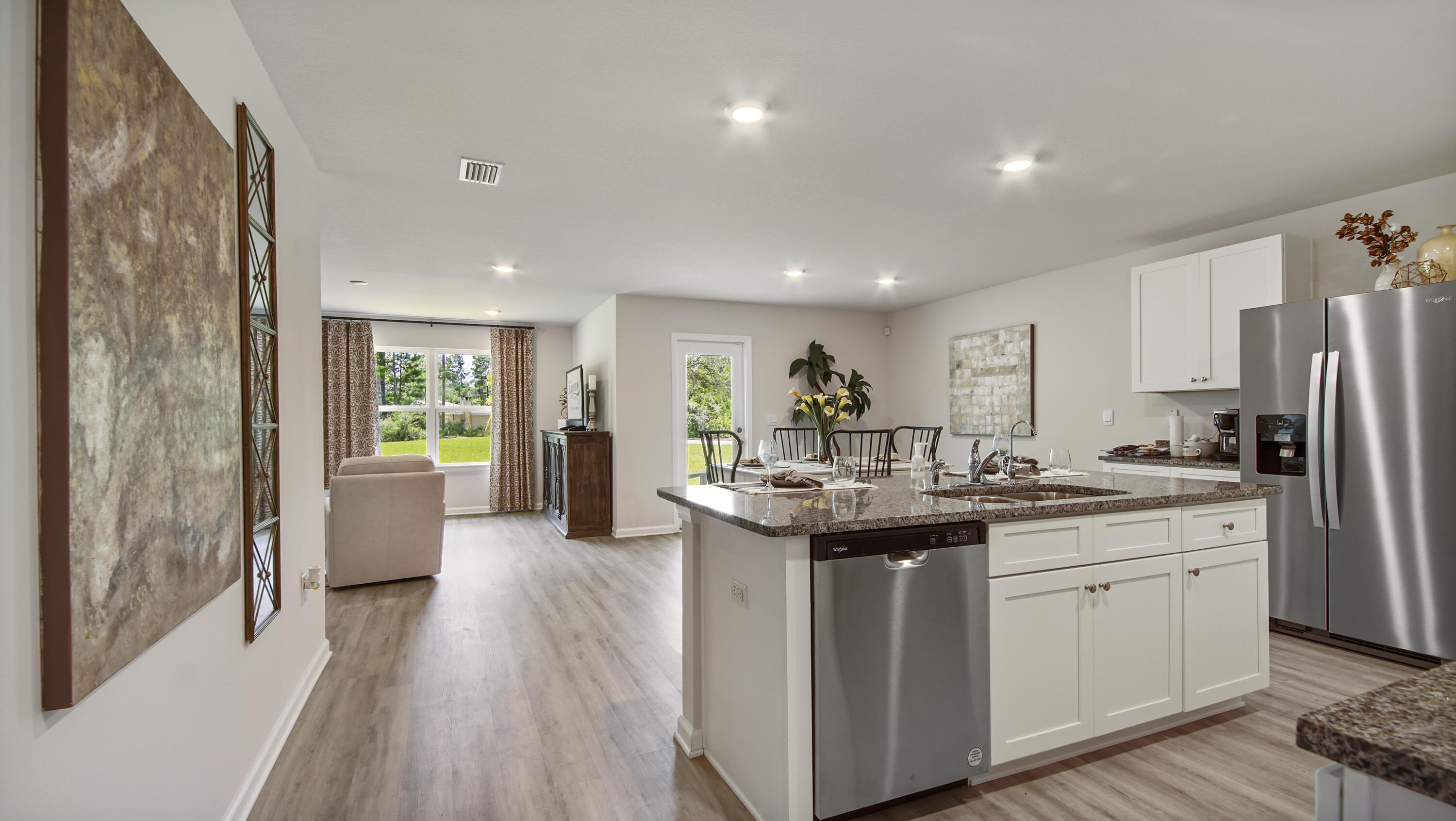 203 Eunola Lane Freeport, FL 32439 - Photo 3 of 38 a kitchen with a sink stove and refrigerator