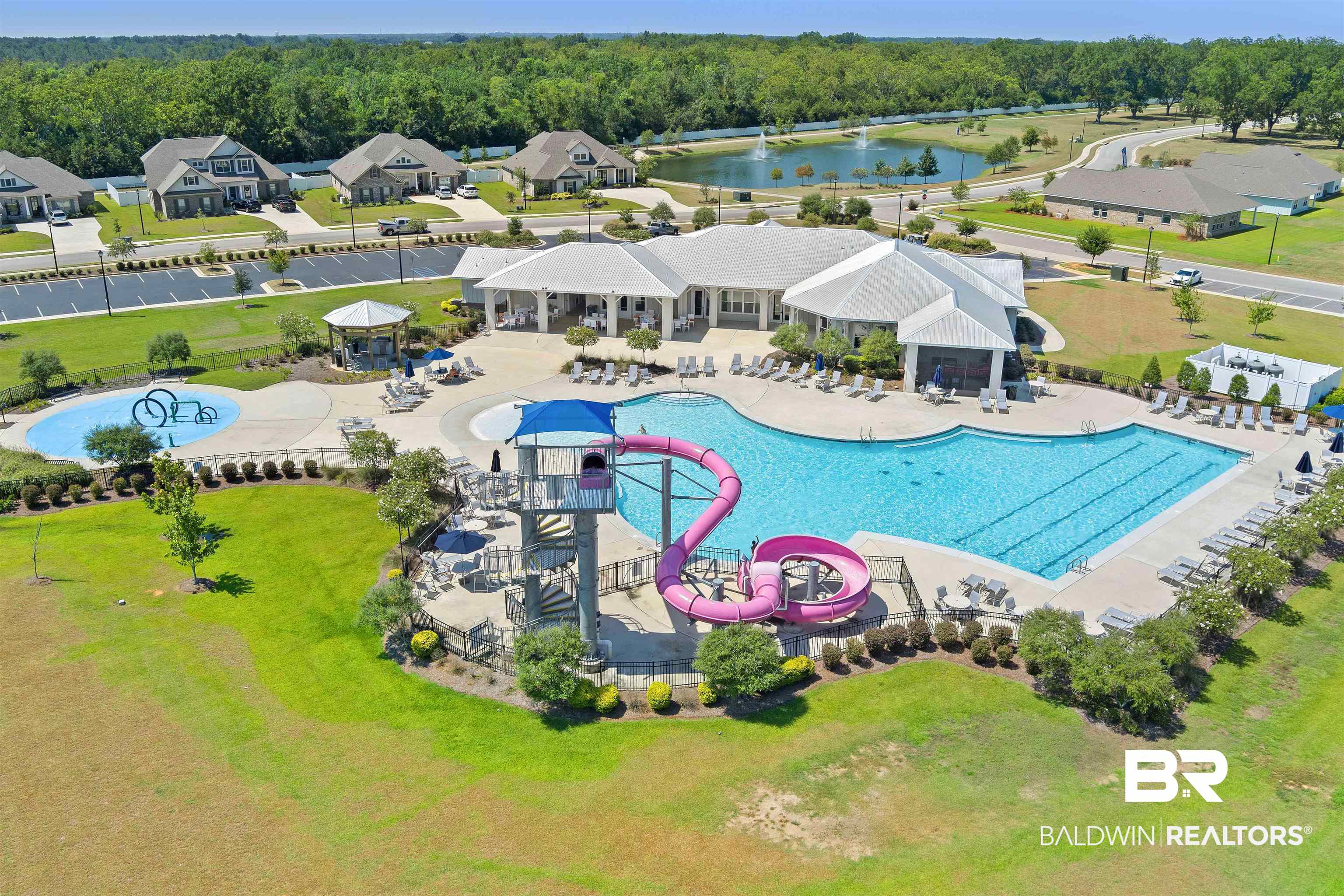 24341 Alydar Loop Daphne, AL 36526 - Photo 45 of 45 Drone / aerial view of a pool area and a nearby body of water