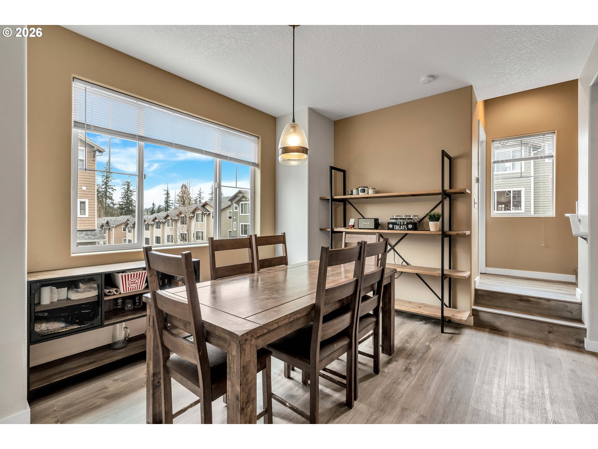 350 Northwest 116th Avenue, Unit 101 Portland, OR 97229 - Photo 15 of 38 a dining room with furniture and window