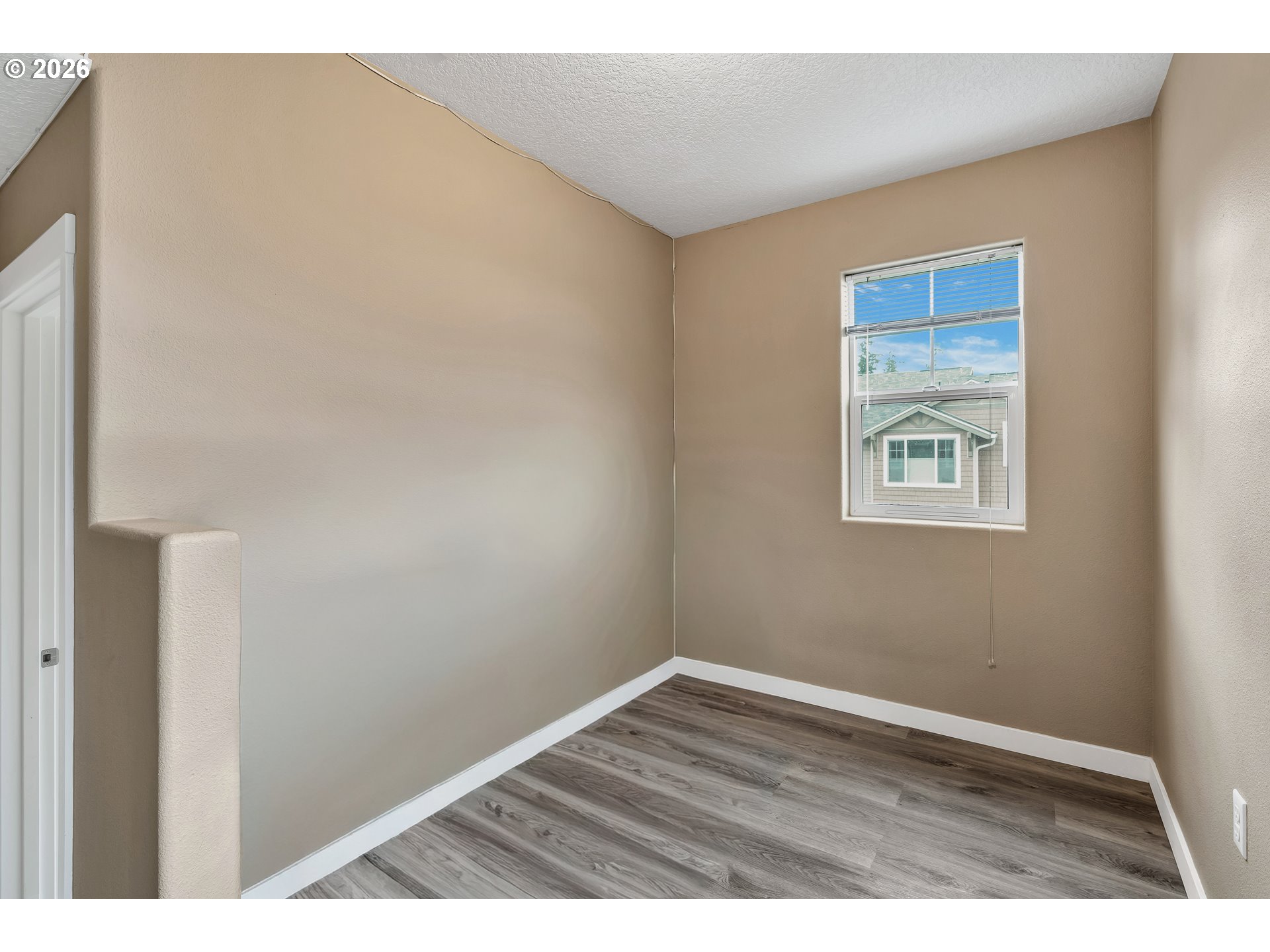 350 Northwest 116th Avenue, Unit 101 Portland, OR 97229 - Photo 21 of 38 a view of an empty room