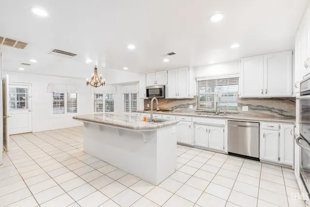 a view of closet area with empty racks