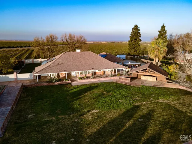 a view of a swimming pool with an ocean view