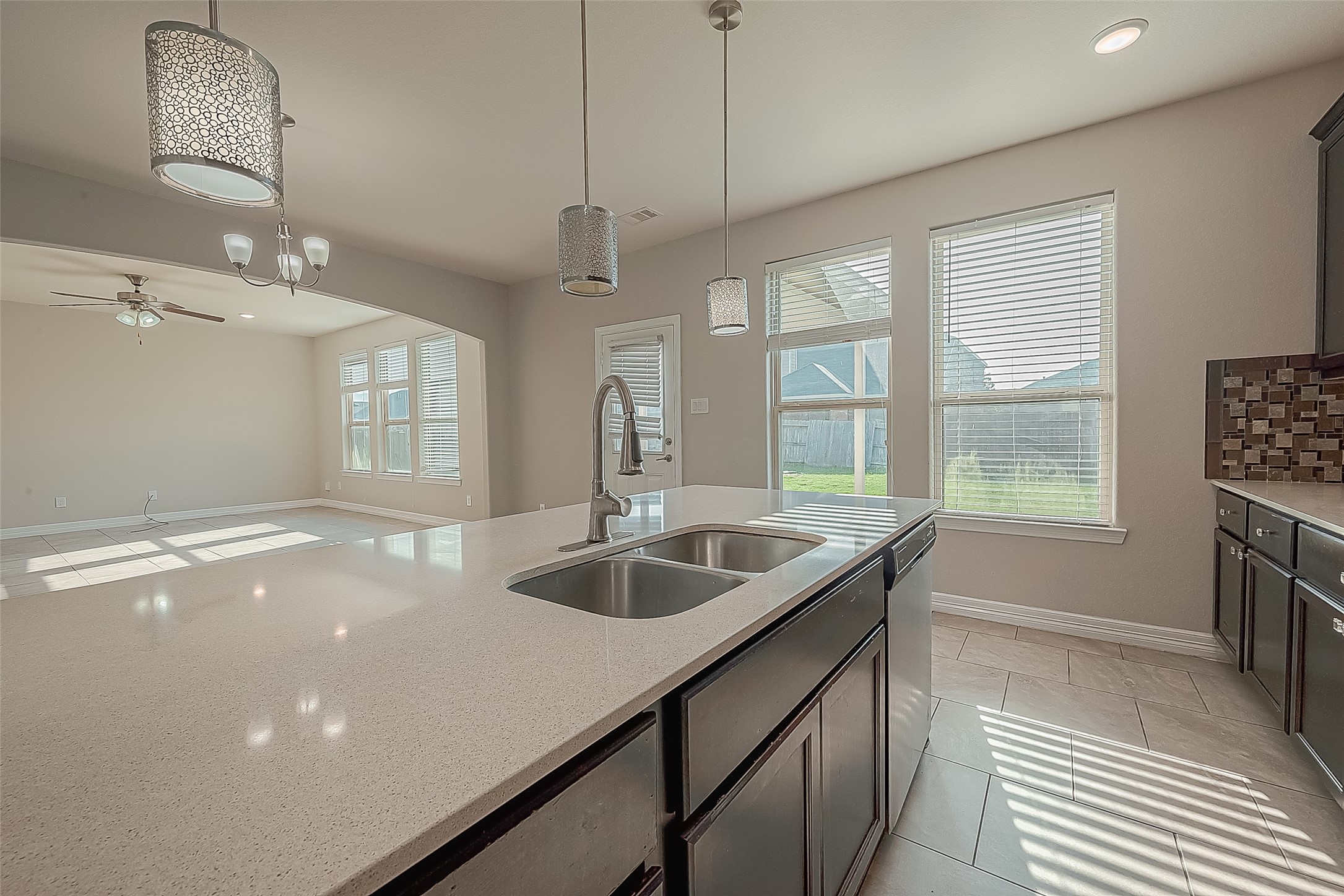 223 Sintra Lk Way Rosenberg, TX 77469 - Photo 11 of 43 a kitchen with sink and window