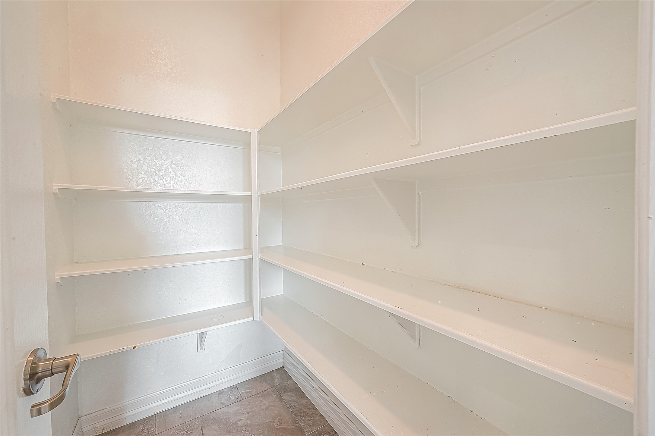 223 Sintra Lk Way Rosenberg, TX 77469 - Photo 15 of 43 a view of an empty walk in closet
