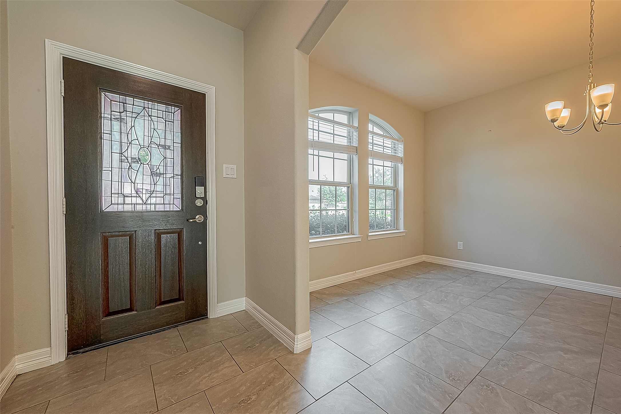 223 Sintra Lk Way Rosenberg, TX 77469 - Photo 4 of 43 a view of an empty room with windows