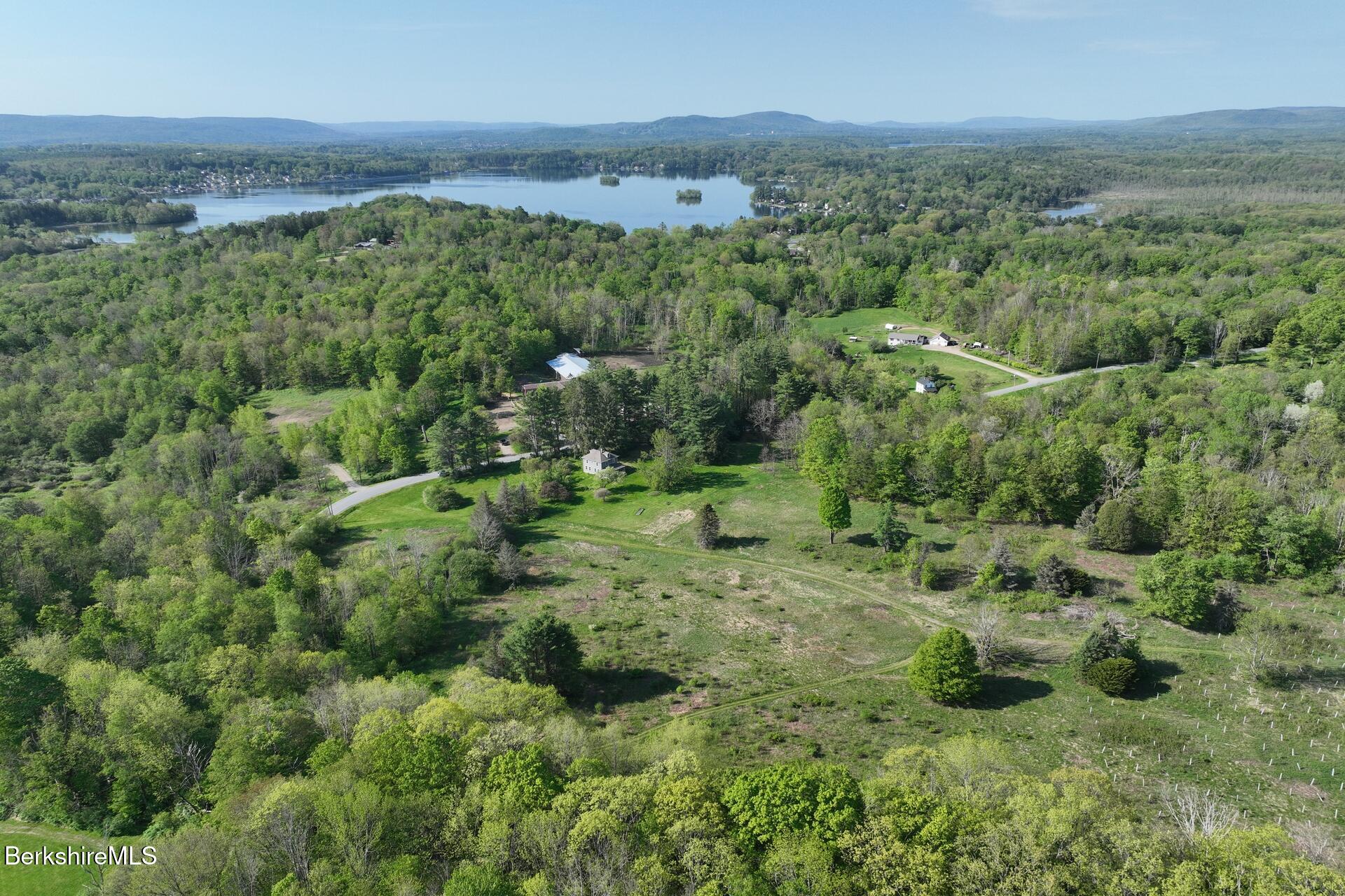 80 Miner Road Lanesborough, MA 01237 - Photo 1 of 10 an aerial view of residential houses with outdoor space and trees