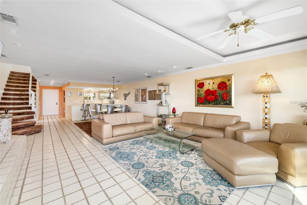 546A Beach Road, Unit A544 Sarasota, FL 34242 - Photo 12 of 59 a living room with furniture and a flat screen tv