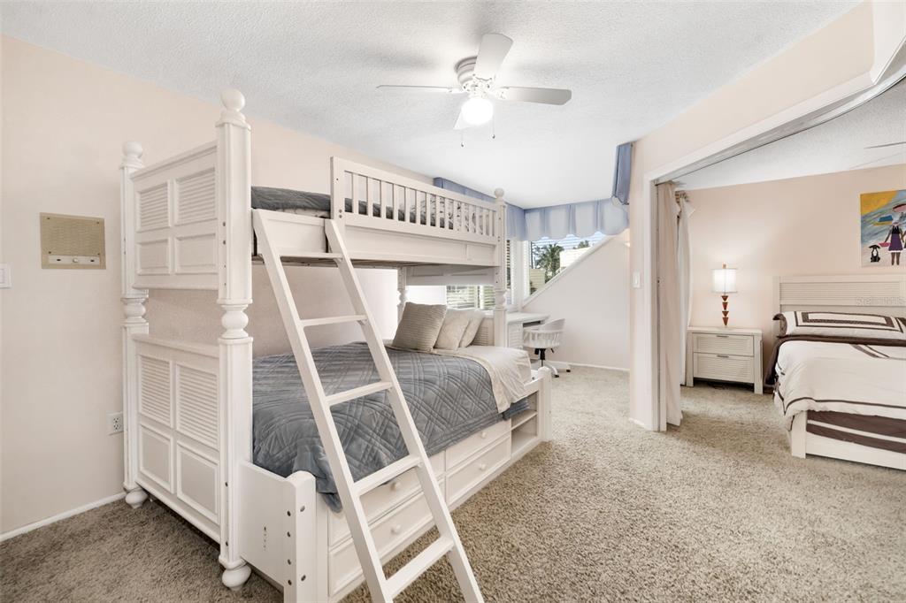 546A Beach Road, Unit A544 Sarasota, FL 34242 - Photo 32 of 59 a living room with furniture and a chandelier