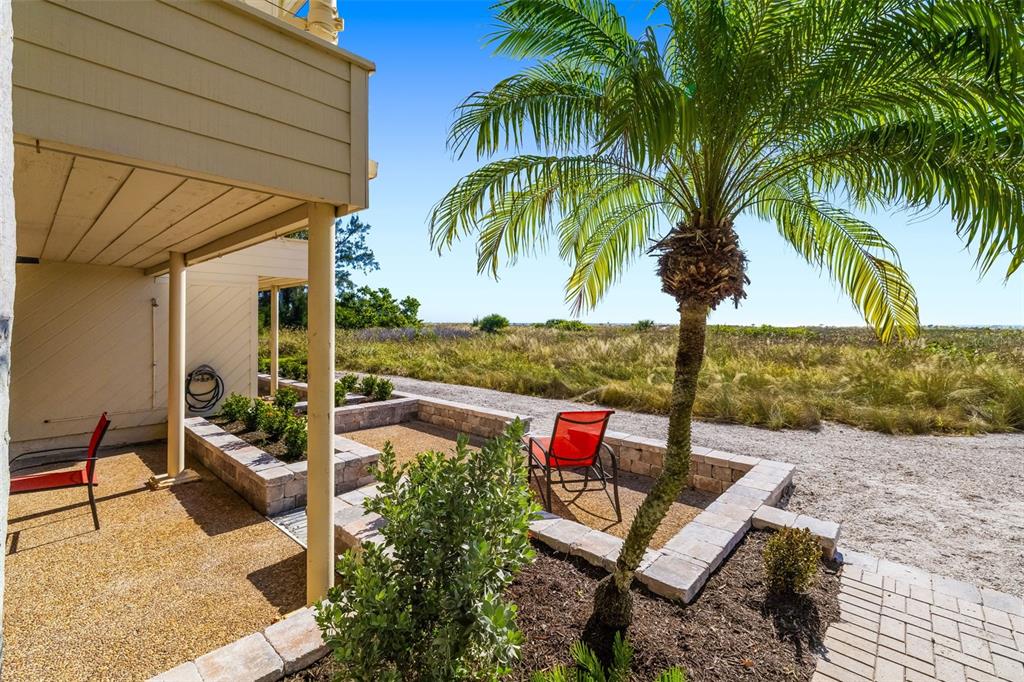 546A Beach Road, Unit A544 Sarasota, FL 34242 - Photo 42 of 59 a view of outdoor space with seating area