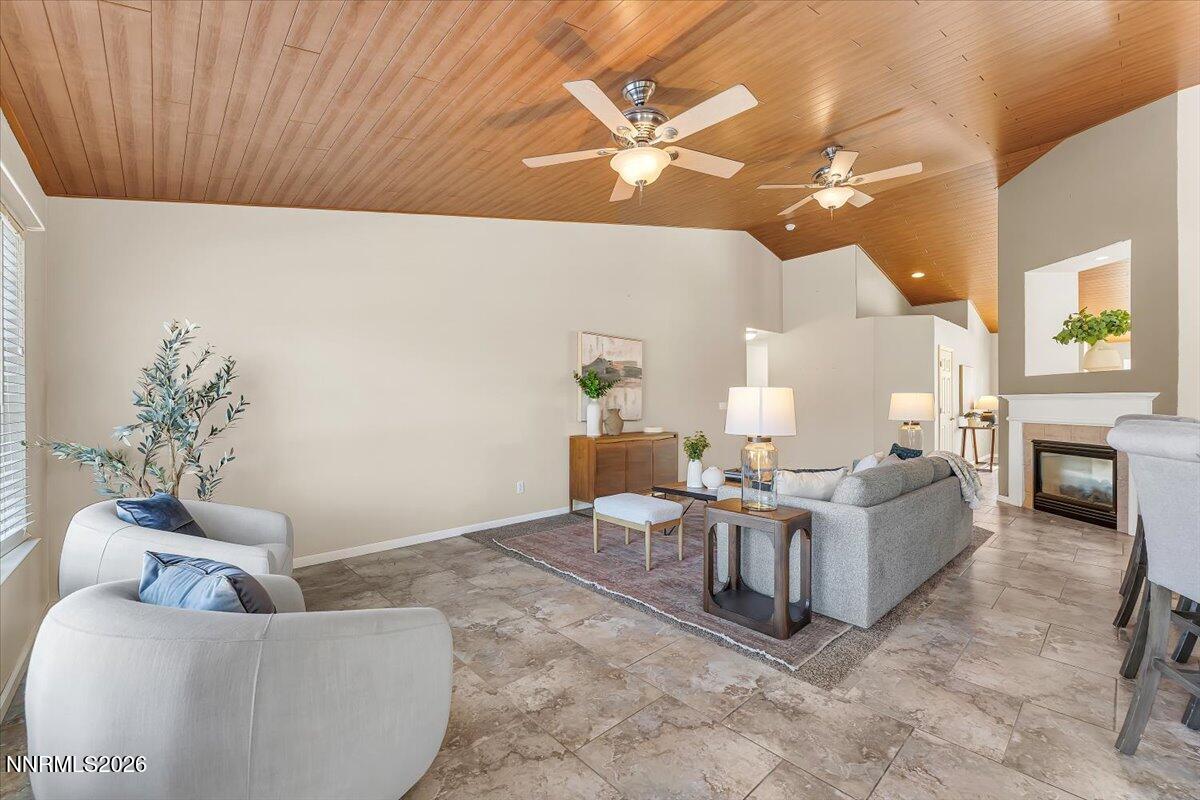 65 Rook Court Sparks, NV 89441 - Photo 12 of 41 a living room with furniture and a chandelier