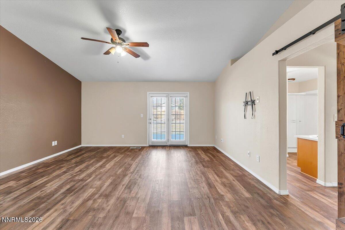 65 Rook Court Sparks, NV 89441 - Photo 20 of 41 wooden floor in an empty room with a window