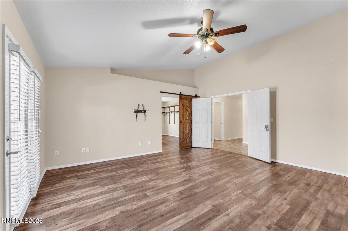 65 Rook Court Sparks, NV 89441 - Photo 21 of 41 wooden floor in an empty room with a window