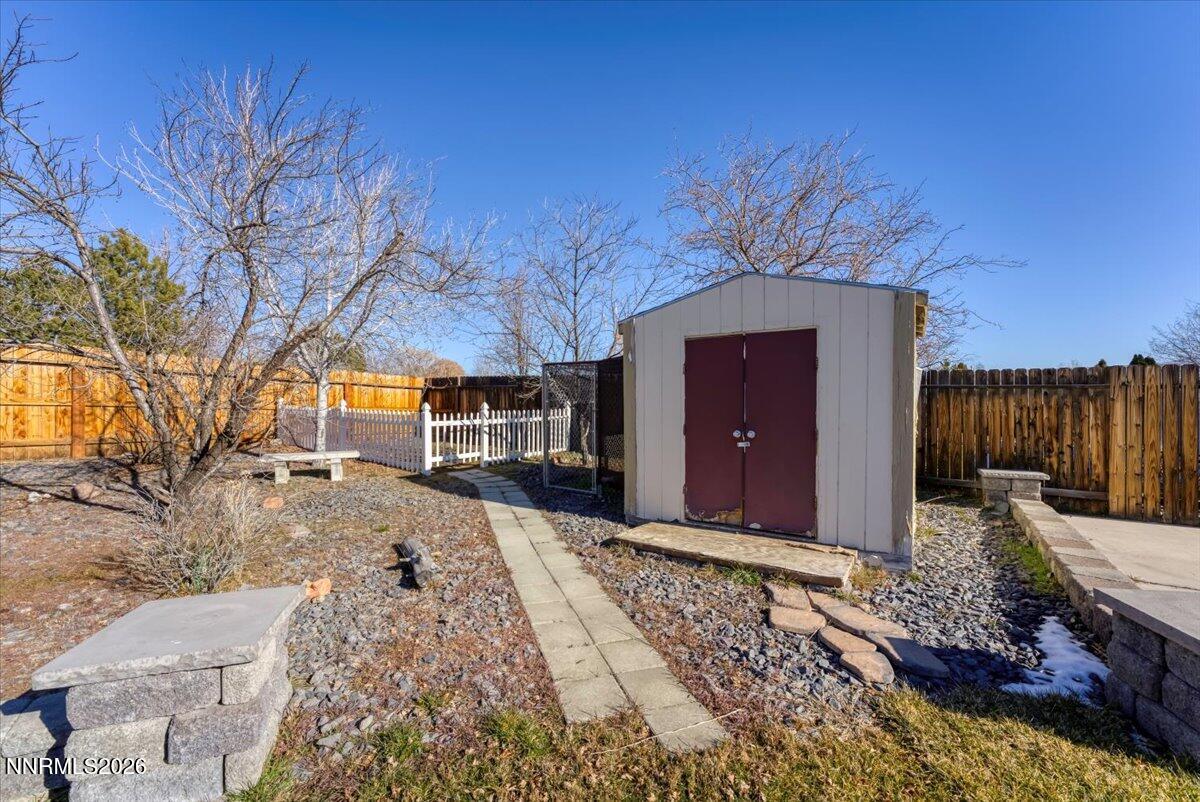 65 Rook Court Sparks, NV 89441 - Photo 34 of 41 a front view of a house with a yard