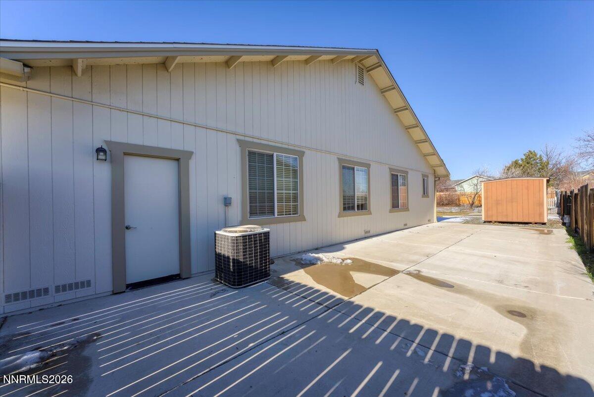 65 Rook Court Sparks, NV 89441 - Photo 37 of 41 a spacious bedroom with a bed and wooden floor