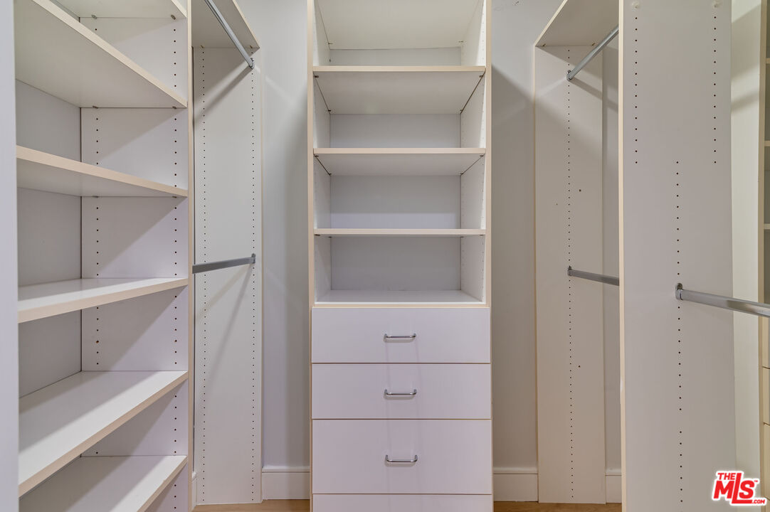 1878 Greenfield Avenue, Unit 104 Los Angeles, CA 90025 - Photo 21 of 35 a view of walk in closet