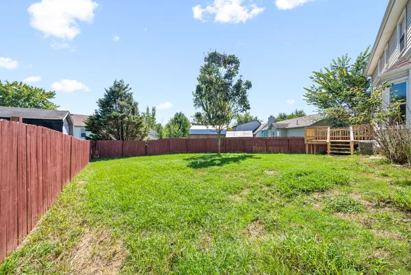 a view of a backyard with a garden