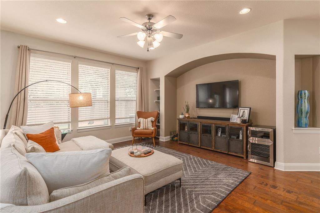 6708 Menchaca Road, Unit 14 Austin, TX 78745 - Photo 17 of 22 Spacious living area featuring wood-finish flooring, recessed lighting, and a ceiling fan