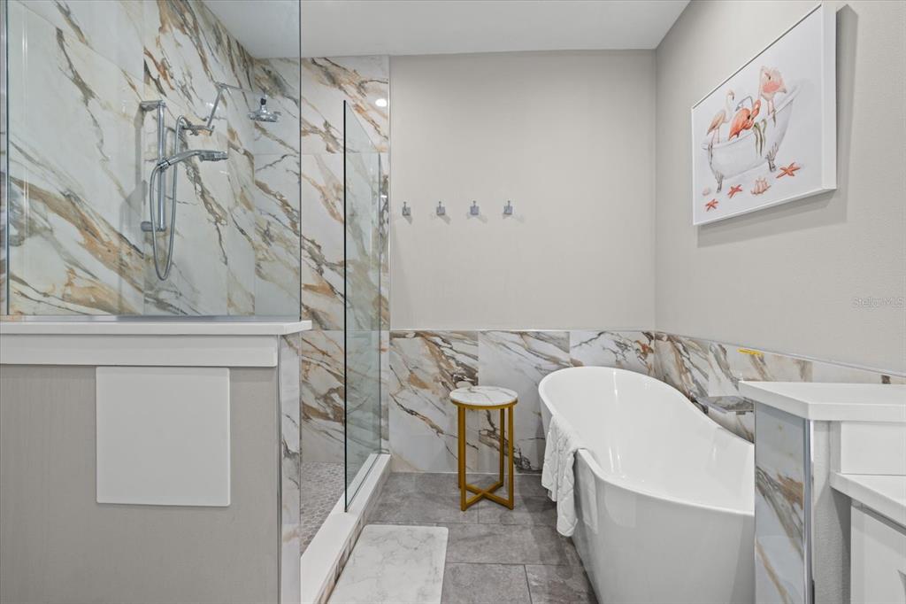 279 Avalon Road Venice, FL 34293 - Photo 25 of 32 a bathroom with a bathtub and a sink