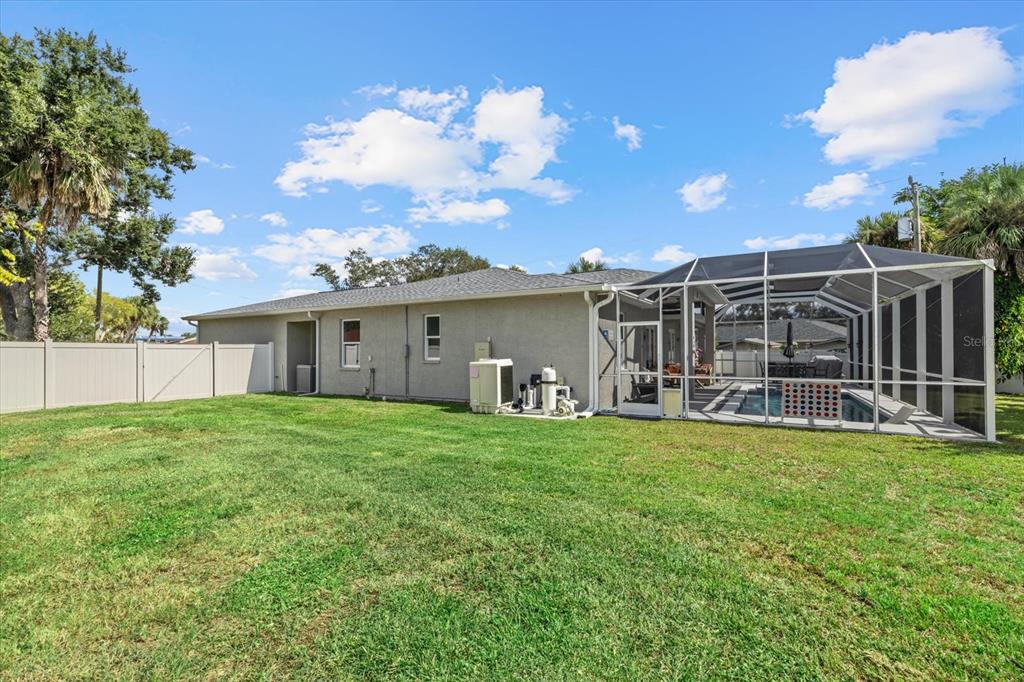 279 Avalon Road Venice, FL 34293 - Photo 3 of 32 a view of a house with backyard and garden