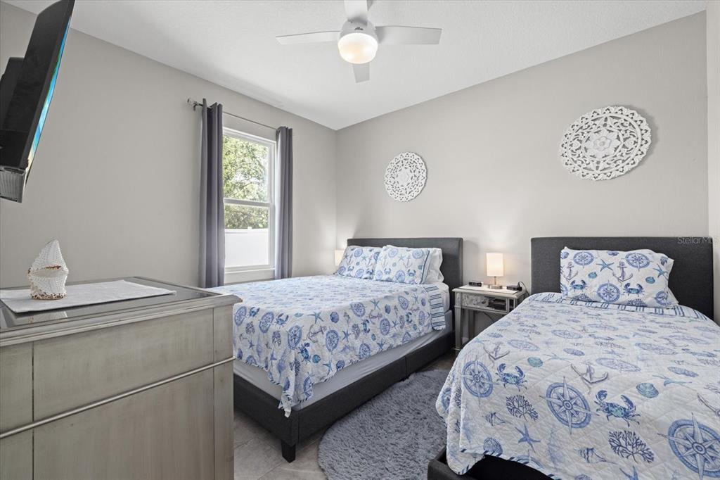 279 Avalon Road Venice, FL 34293 - Photo 31 of 32 a bedroom with two beds and a table