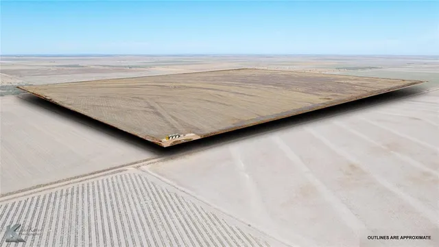 a view of wooden floor with a ceiling fan