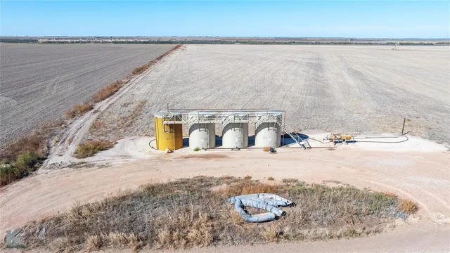 a view of a swimming pool and an outdoor space