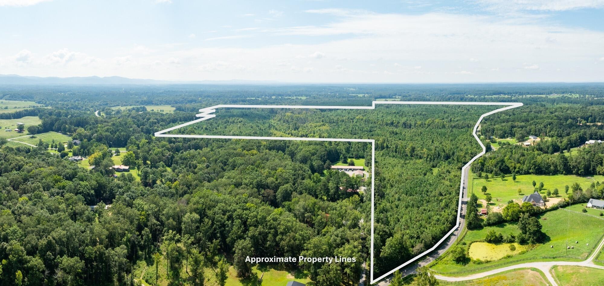243 Wilson Road Chatsworth, GA 30705 - Photo 3 of 11 an aerial view of multiple house