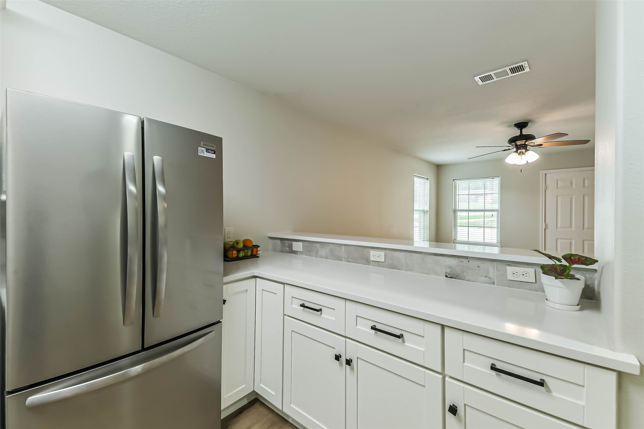 1799 League Line Road, Unit 1 Conroe, TX 77304 - Photo 11 of 32 Kitchen looking into the living room.