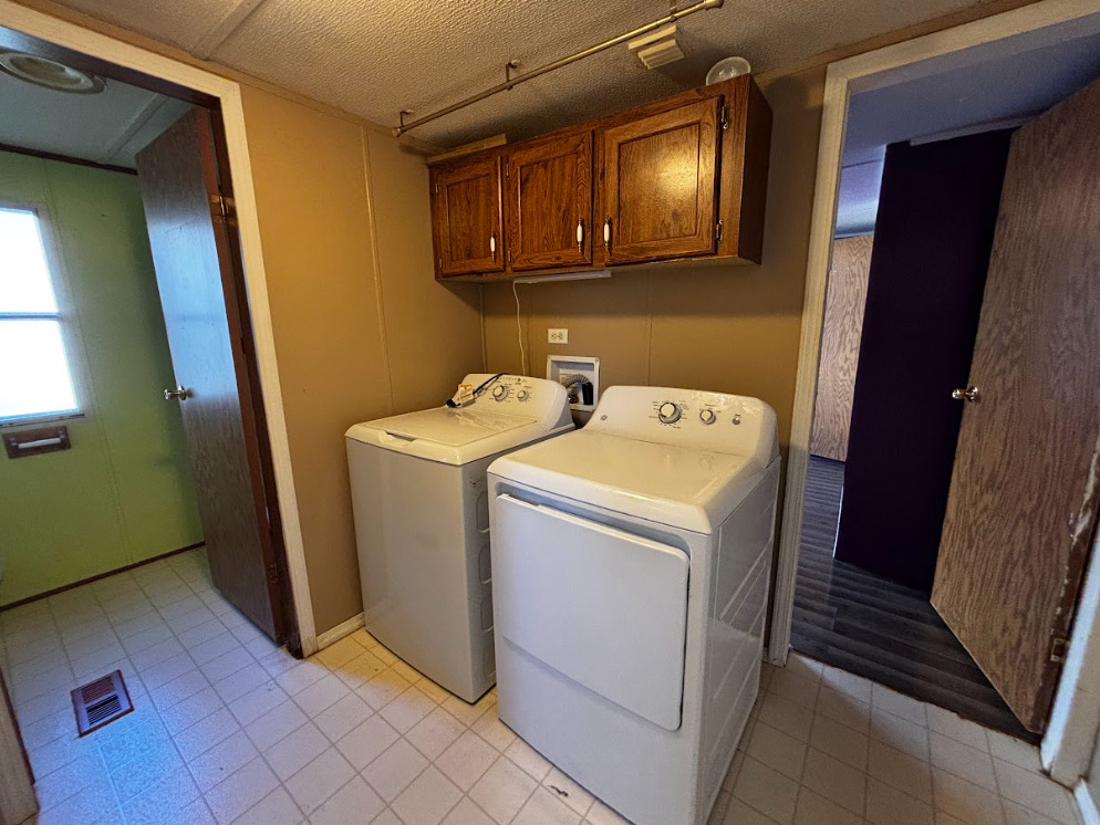 29 Pulaski Street Mahomet, IL 61853 - Photo 17 of 17 a utility room with dryer and washer