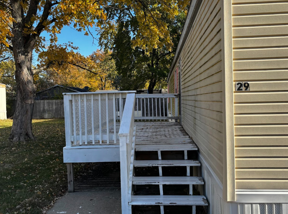 29 Pulaski Street Mahomet, IL 61853 - Photo 3 of 17 a view of outdoor space with wooden deck and furniture