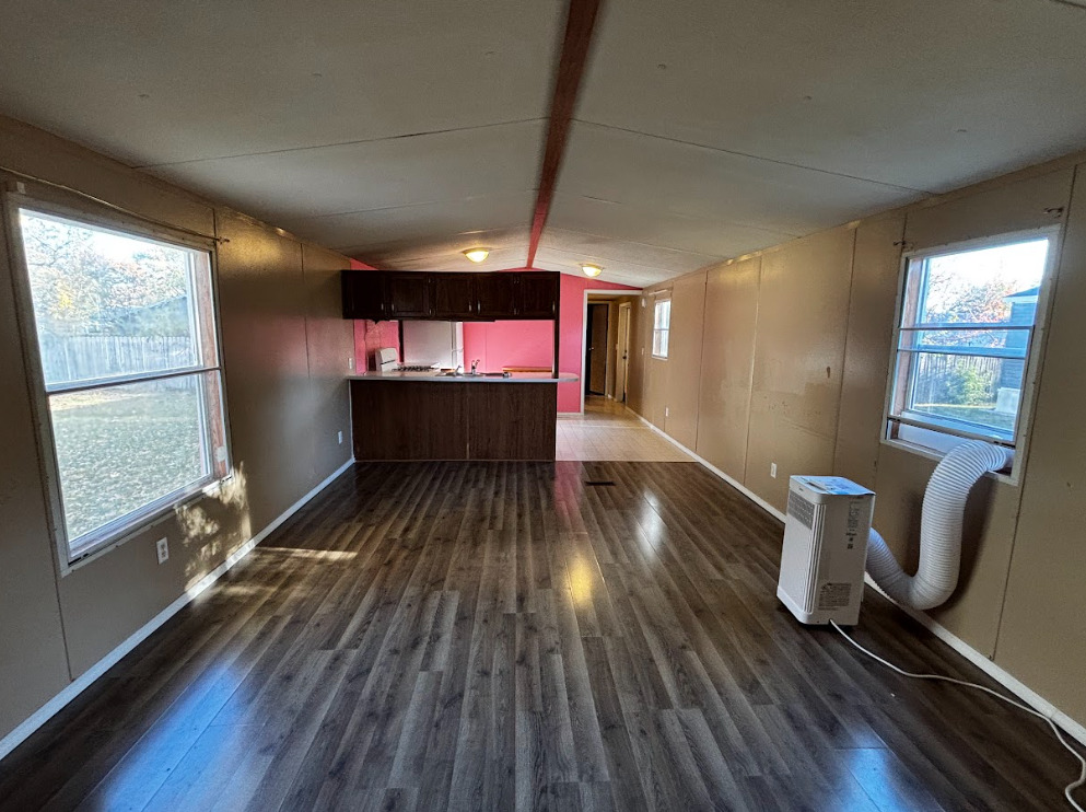 29 Pulaski Street Mahomet, IL 61853 - Photo 5 of 17 a view of room with window and wooden floor